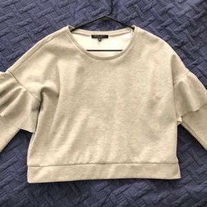 Lightweight sweater. Crop top-like.